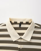Striped polo shirt with a collar on a light gray background