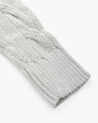 Close-up of the sleeve of an Altivieri Pima cotton sweater.