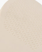 View of the sole of a men's suede moccasin.