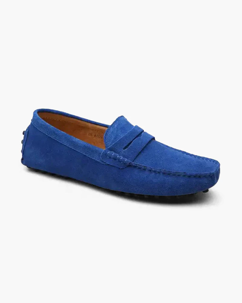 Blue suede loafer shoe on a white background