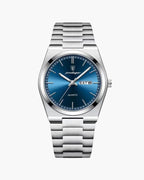 Marine nautical style watch with blue dial and stainless steel.