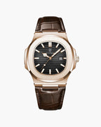 The Lisbon men's classic watch with a black dial and brown leather strap.