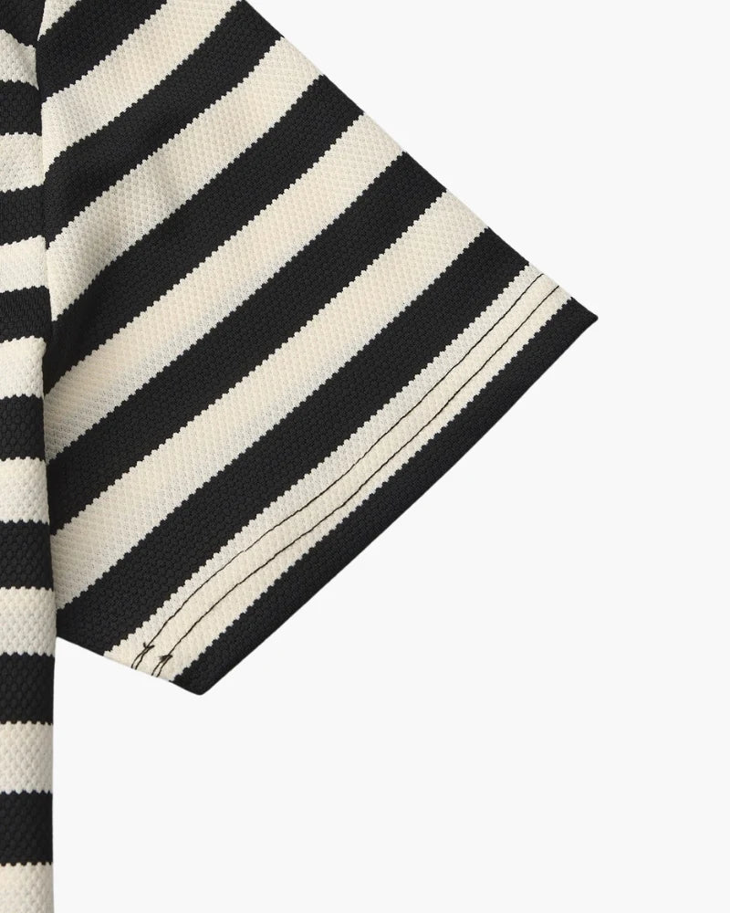 Black and white striped fabric on a white background