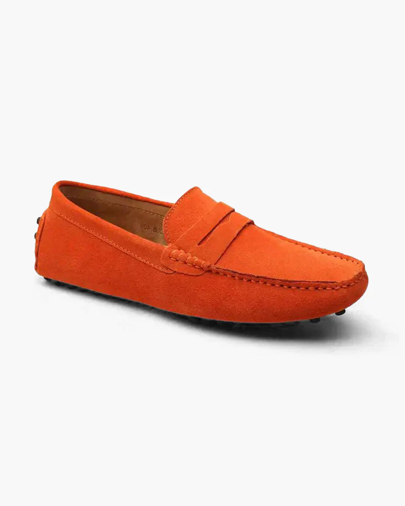 Orange loafer shoe on a white background