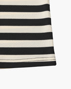 Close-up of a black and white striped fabric on a white background