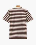 Brown and white striped polo shirt on a hanger against a white background