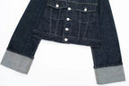Dark blue denim jacket with gray cuffs on a white background
