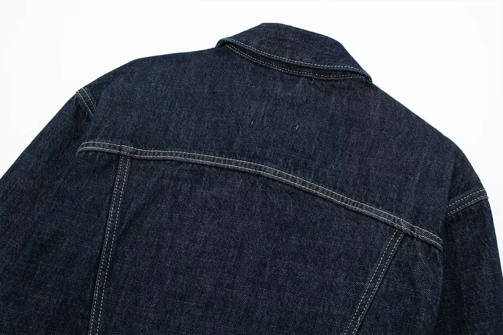 Dark blue denim jacket on a white background