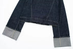 Dark blue denim jacket with gray cuffs on a white background