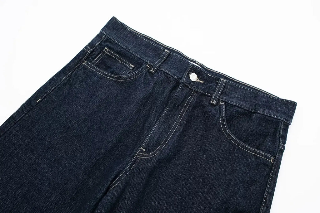 Dark blue jeans on a white background