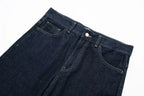 Dark blue jeans on a white background