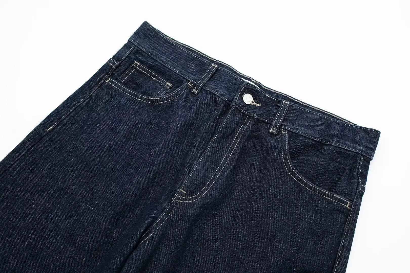 Dark blue jeans on a white background