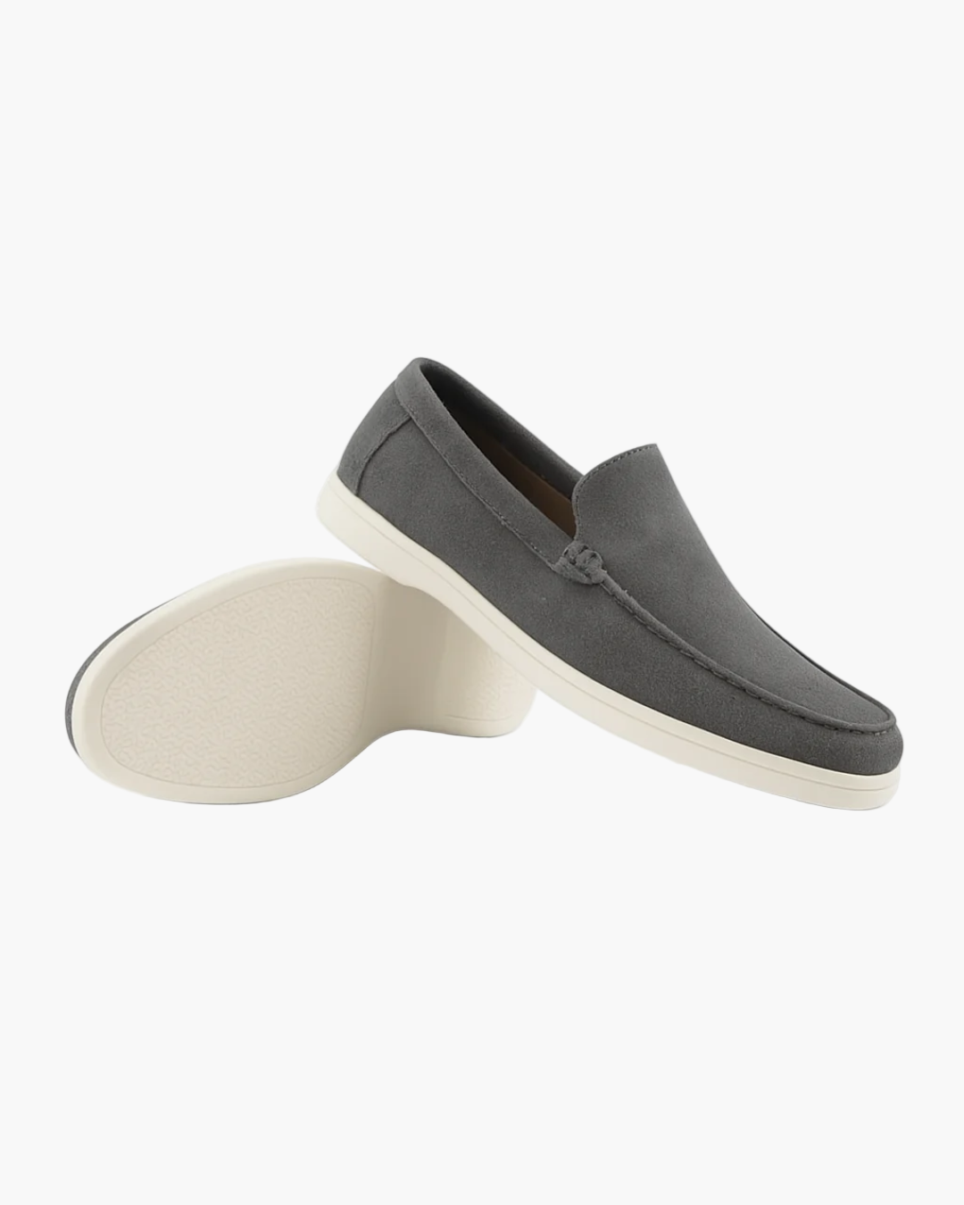 Gray loafers with white soles on a white background