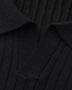 Close-up of the textured ribbed fabric on the Altivieri knit polo.
