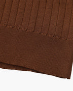 Close-up of the textured ribbed fabric on the Altivieri knit polo.