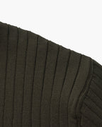 Close-up of the textured ribbed fabric on the Altivieri knit polo.