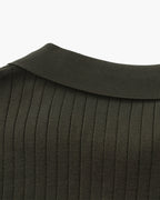 Close-up of the textured ribbed fabric on the Altivieri knit polo.