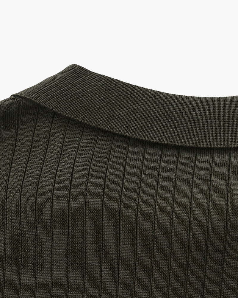 Close-up of the textured ribbed fabric on the Altivieri knit polo.