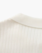 Close-up of the textured ribbed fabric on the Altivieri knit polo.