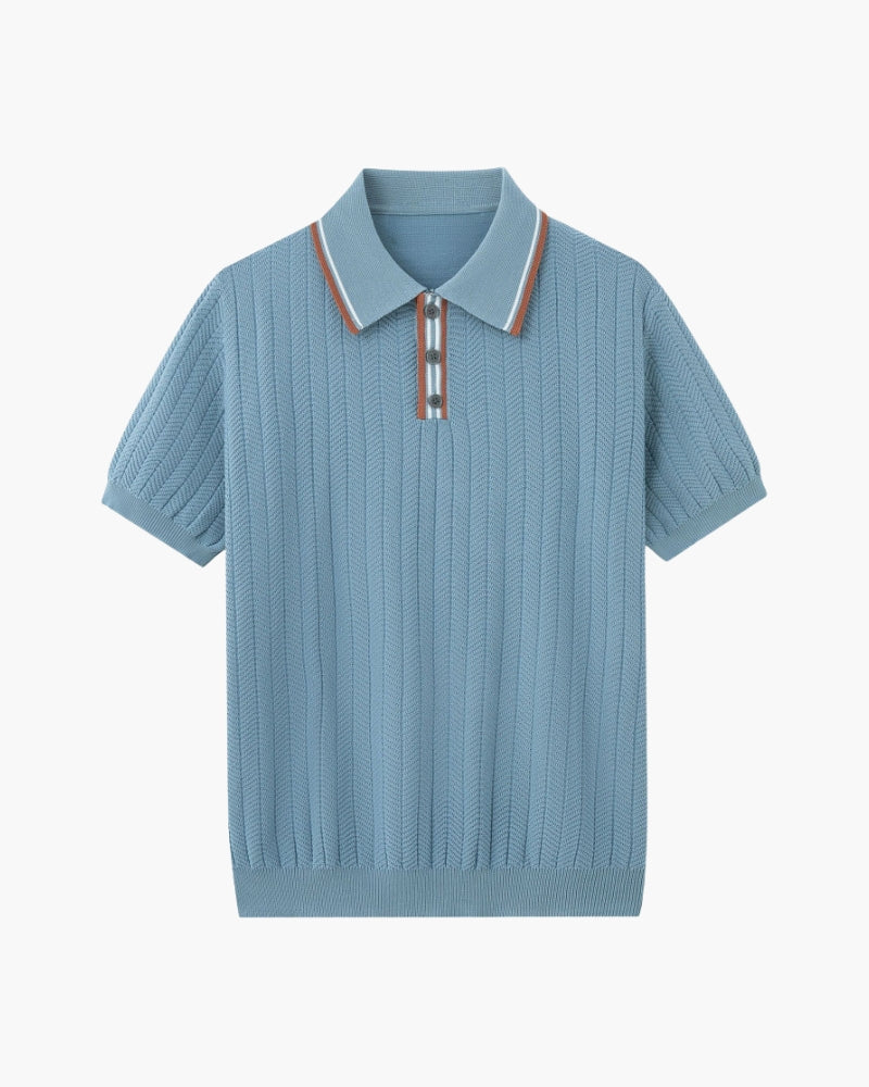 Blue ribbed knit polo shirt with striped collar on a white background