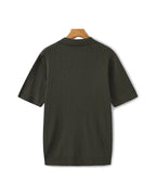 Back profile of the Riviera ribbed polo shirt showing its classic fit.