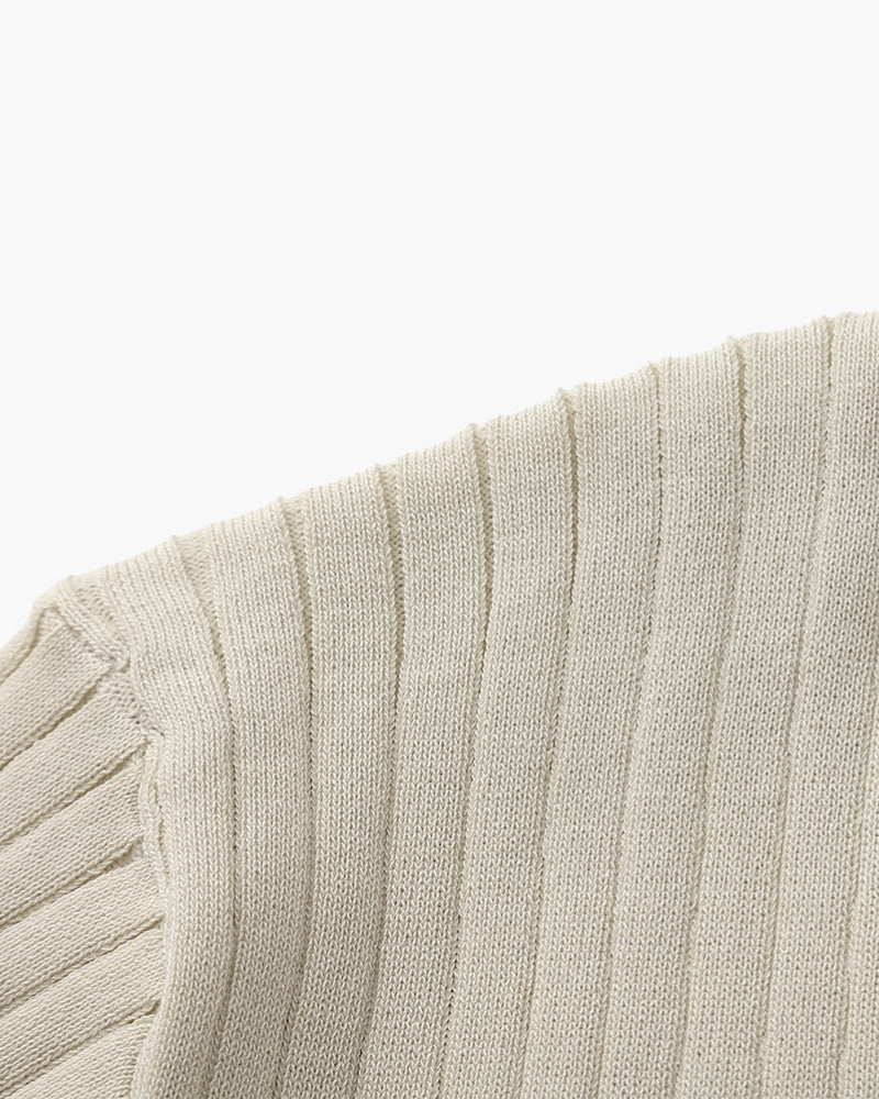 Close-up of the textured ribbed fabric on the Altivieri knit polo.