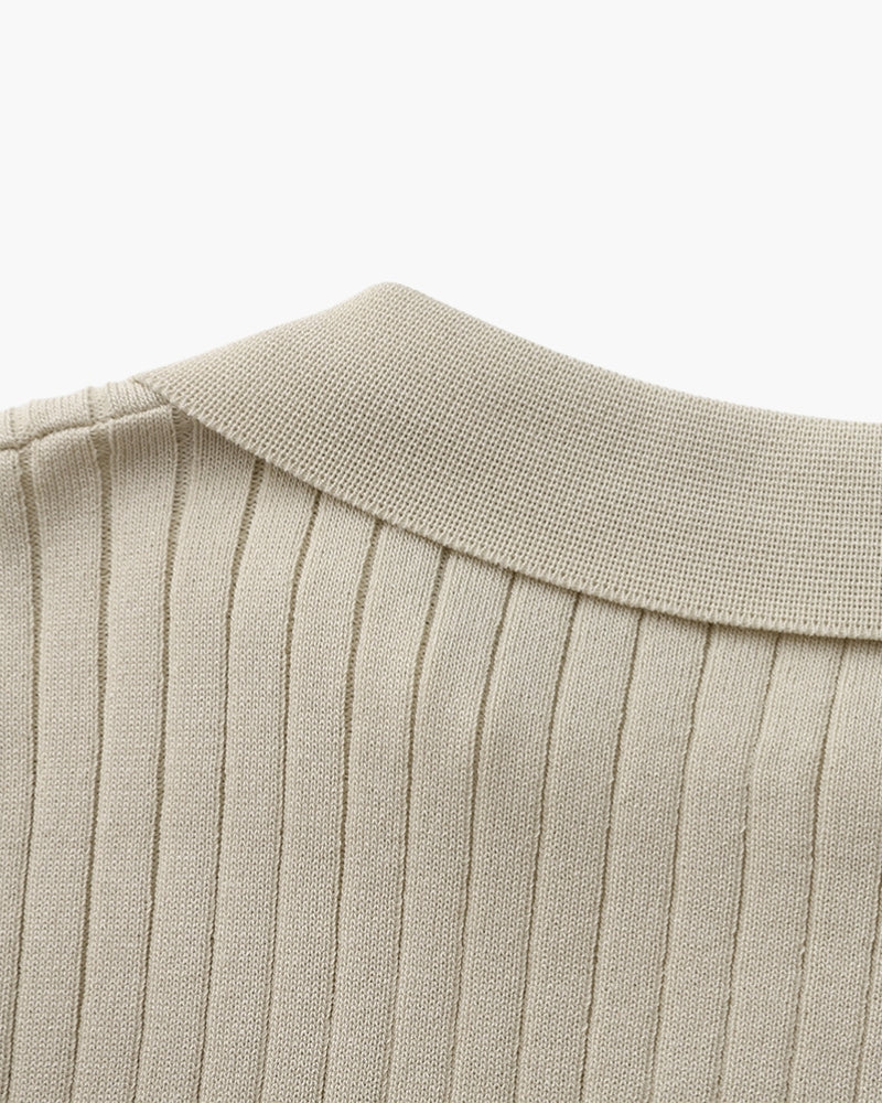 Close-up of the textured ribbed fabric on the Altivieri knit polo.