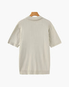 Back profile of the Riviera ribbed polo shirt showing its classic fit.