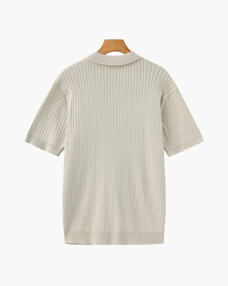 Back profile of the Riviera ribbed polo shirt showing its classic fit.