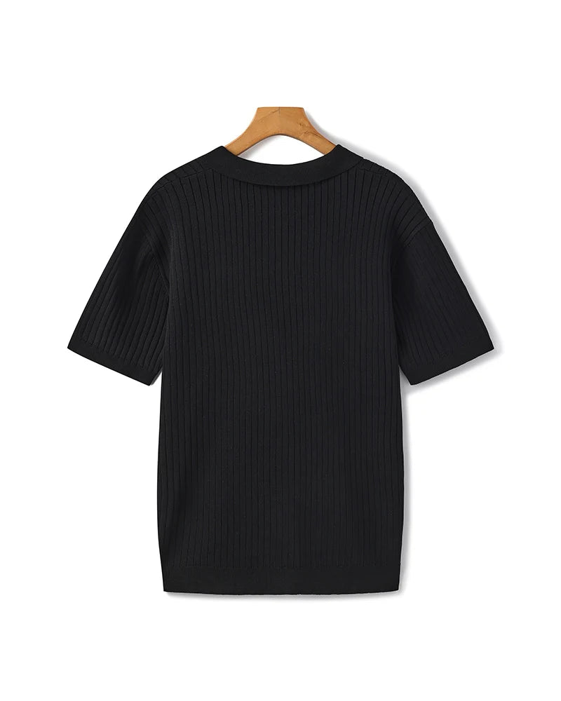 Back profile of the Riviera ribbed polo shirt showing its classic fit.