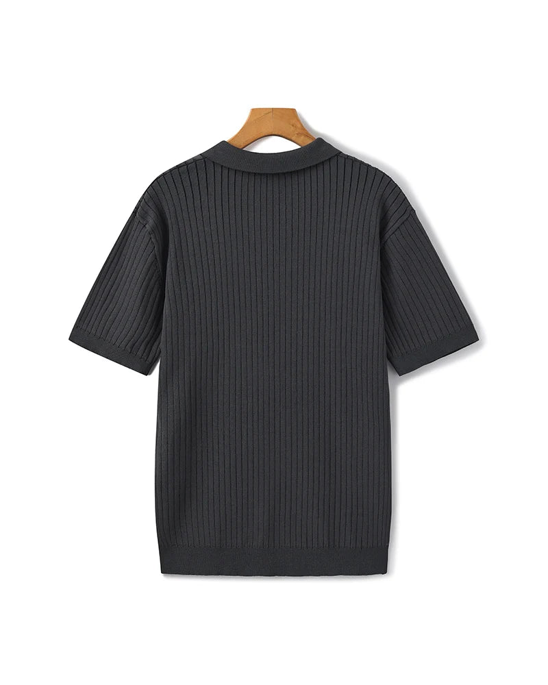Back profile of the Riviera ribbed polo shirt showing its classic fit.