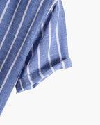 Blue and white striped fabric on a white background