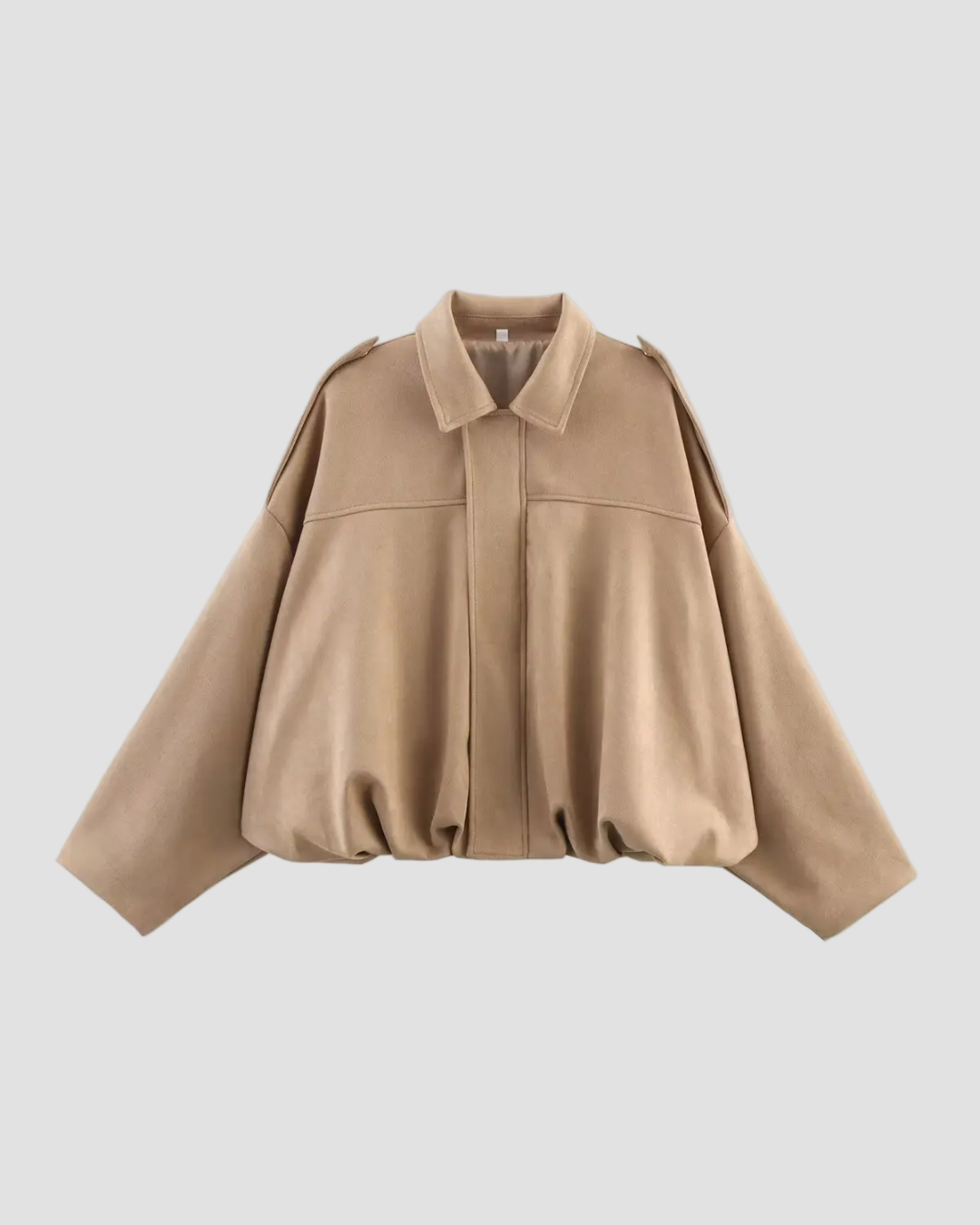 Beige cape-style jacket on a Khaki background