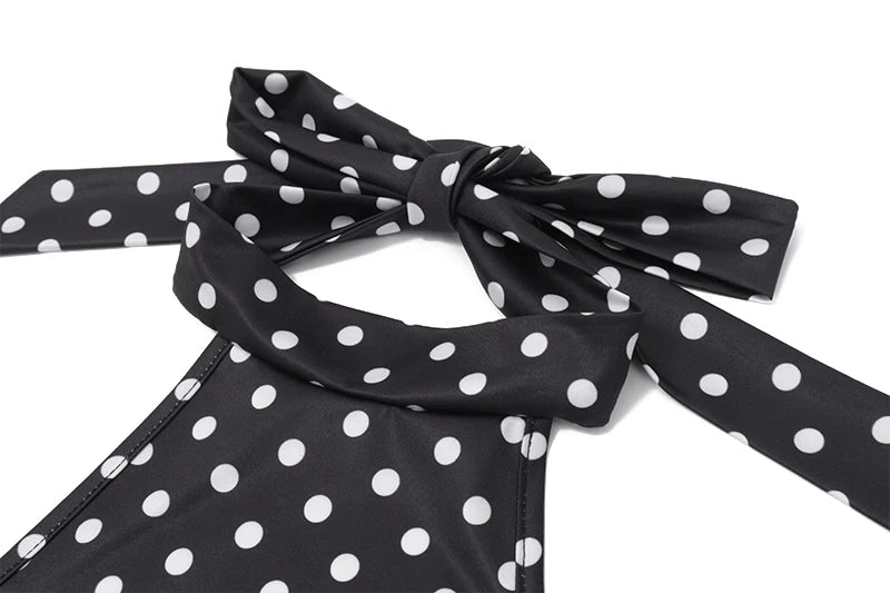Close-up of the backless design and halter neck of the Altivieri Parisian dress