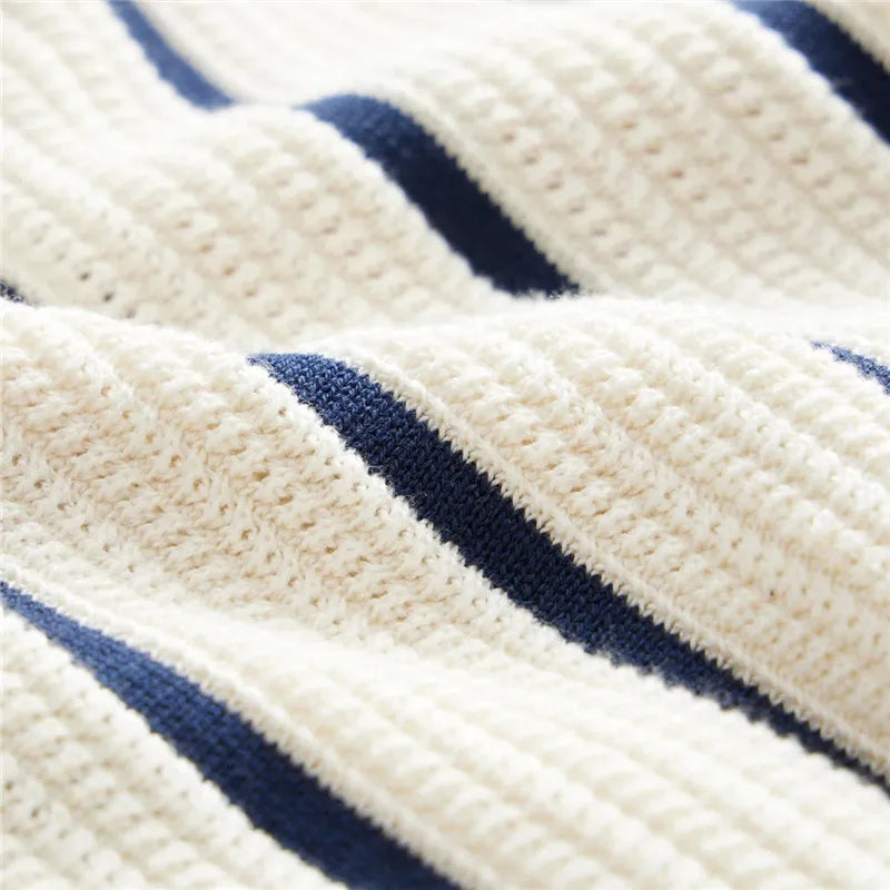Close-up of the silky, breathable 100% viscose knit fabric on the Altivieri Portofino polo.