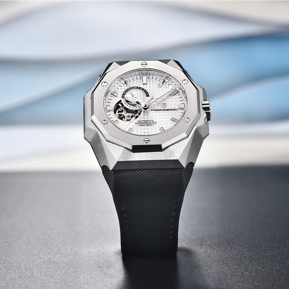 Luxury watch with a black strap on a reflective surface