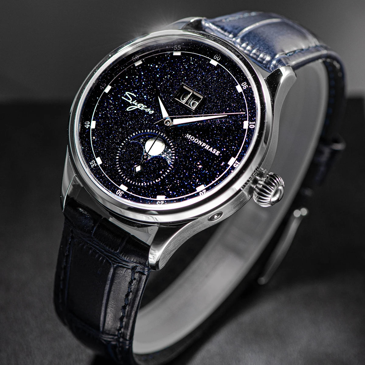 Luxury watch with black leather strap and starry dial on a dark background