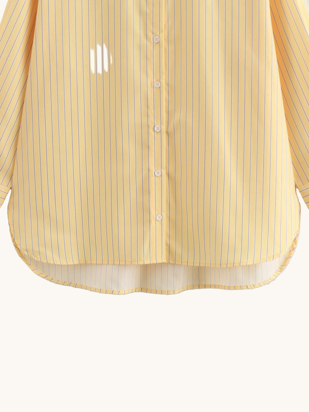 Yellow striped shirt on a light gray background