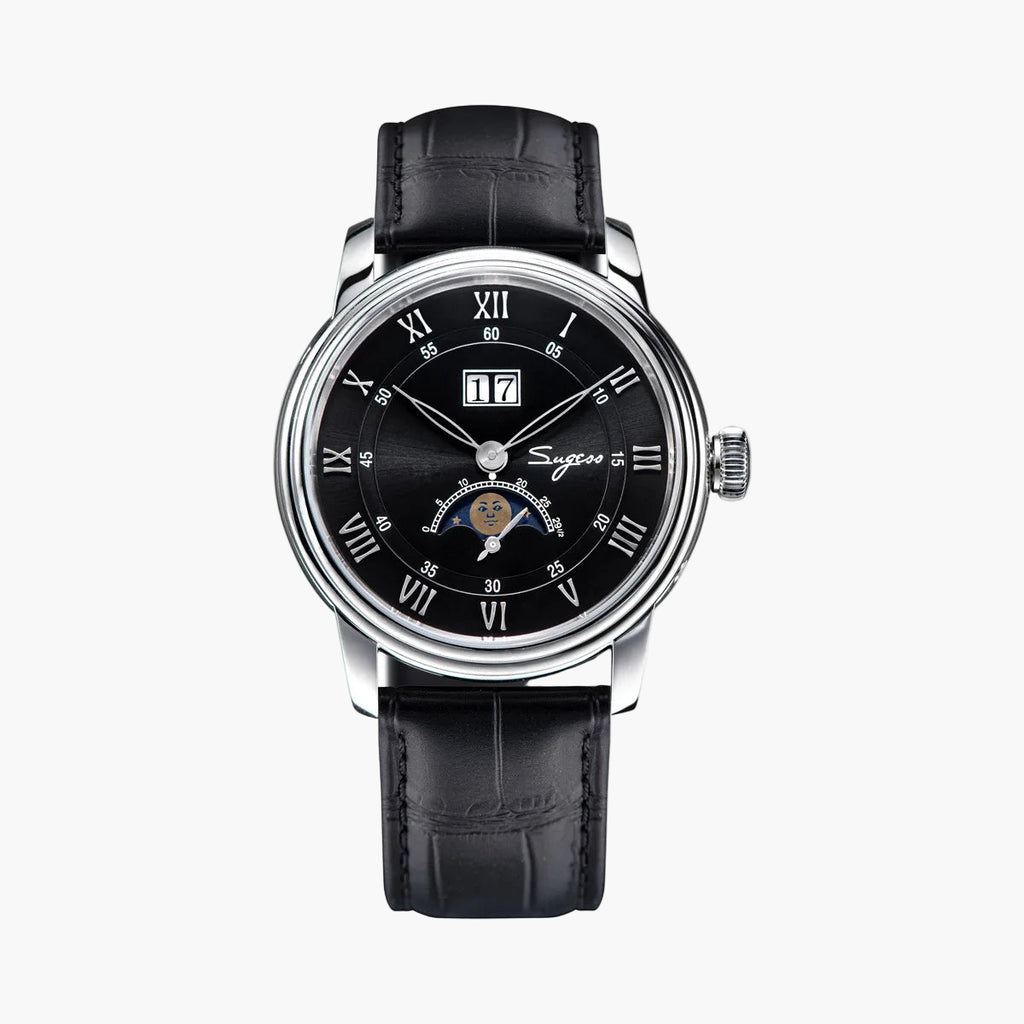 Black wristwatch with silver case and black leather strap on a white background