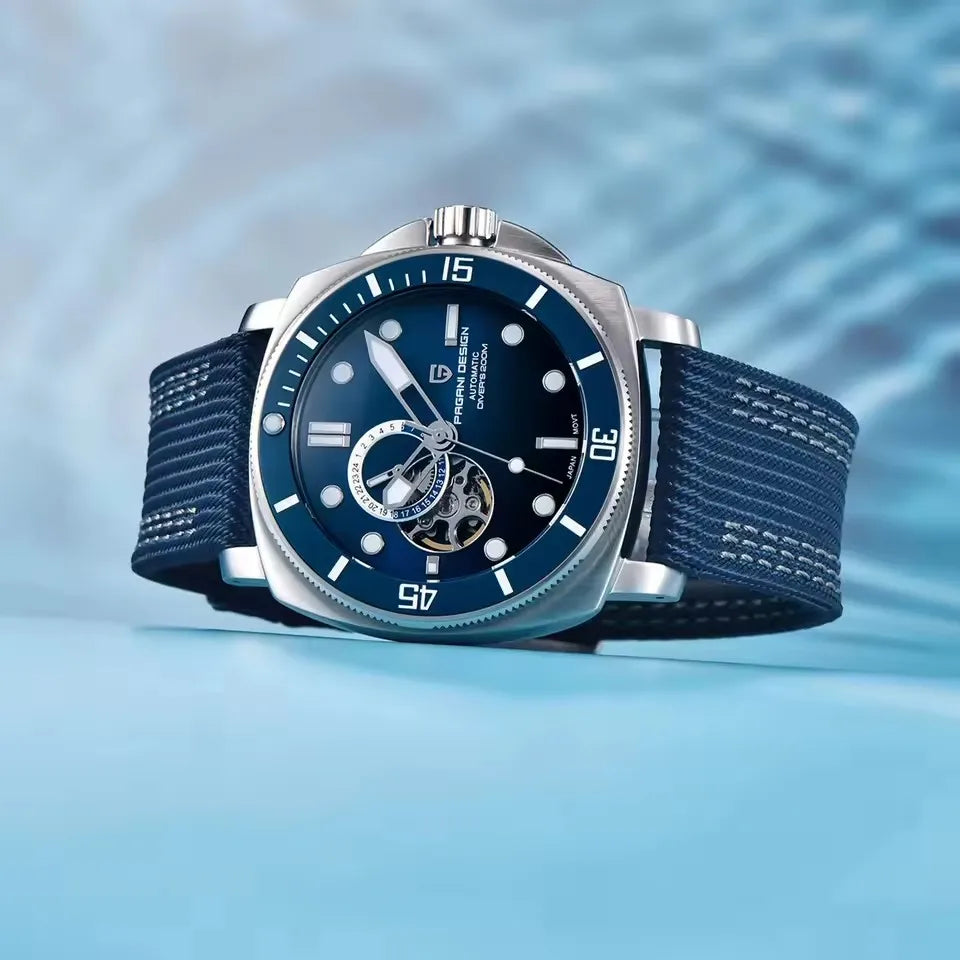 Blue watch with a textured strap on a blue water background