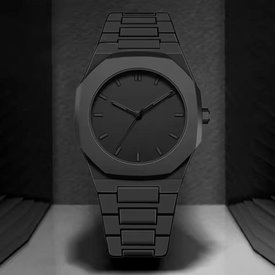Close-up of the deep black dial and polished silver hands on the Monaco Noir watch.