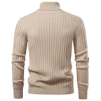 Beige ribbed sweater on a white background