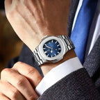Man wearing the Geneva classic dress watch with a cuffed shirt.