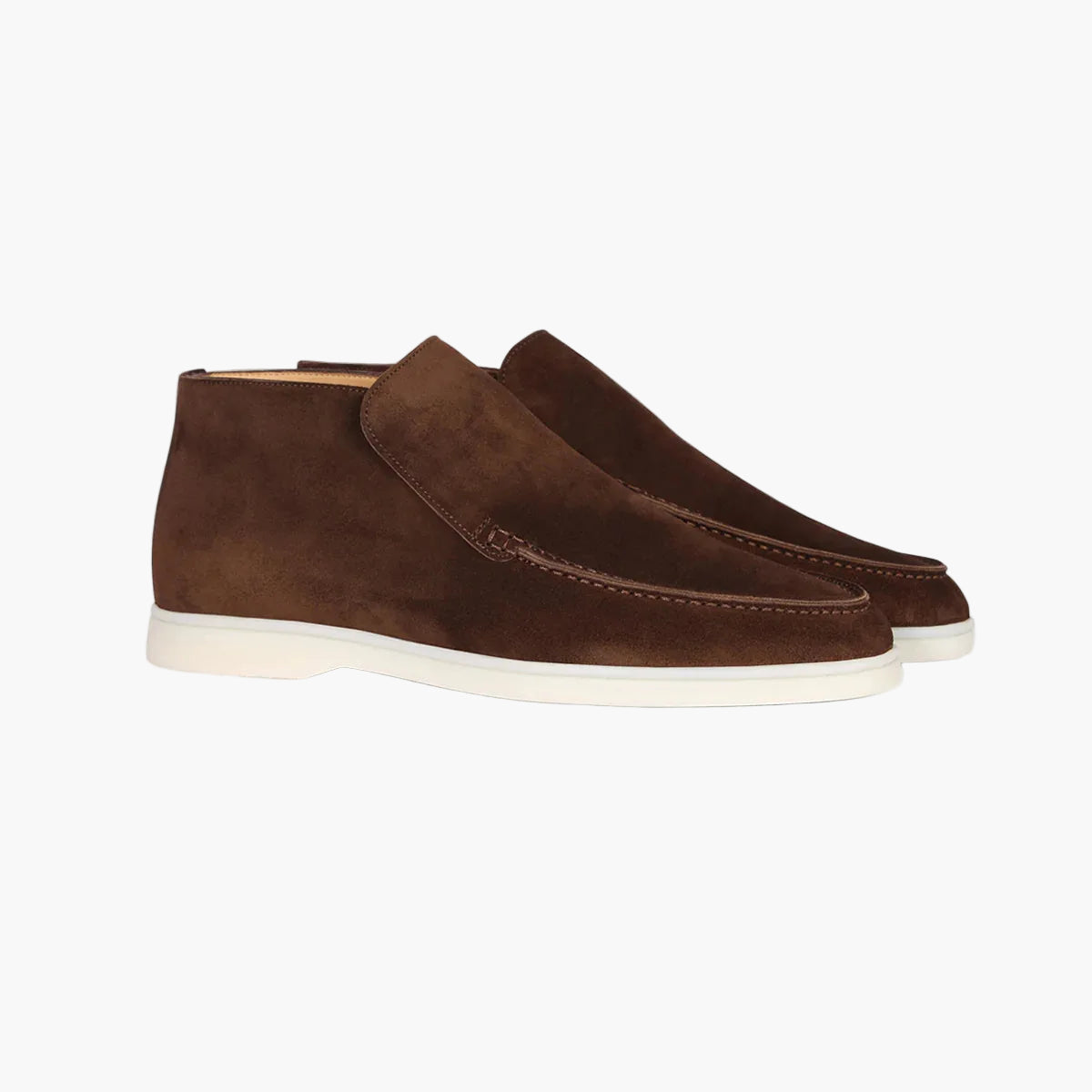 Pair of brown suede shoes on a light gray background
