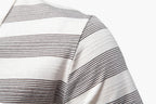 Close-up of a striped fabric with white and gray lines on a white background