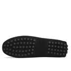 Black sole with textured pattern on a white background