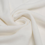 Close-up of white fabric with folds