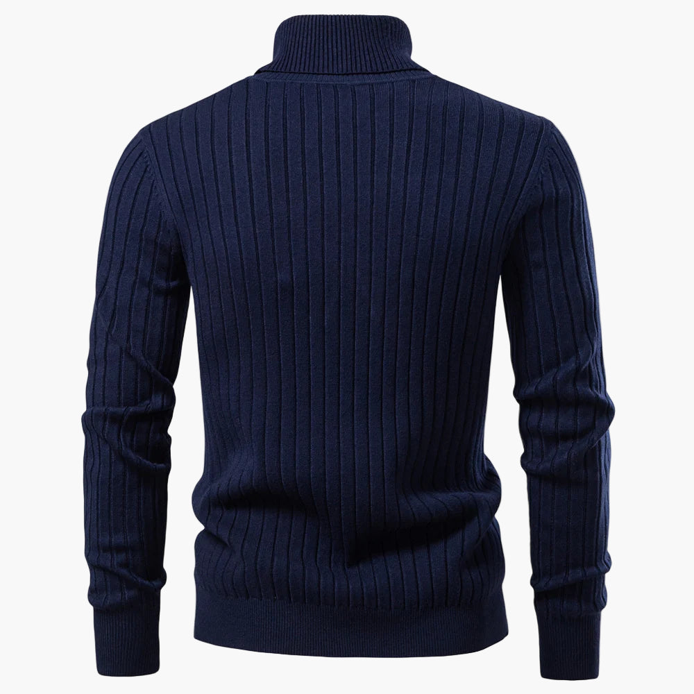 Navy blue ribbed sweater on a white background