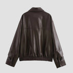 Brown leather jacket on a white background