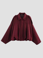 Maroon cape on a white background